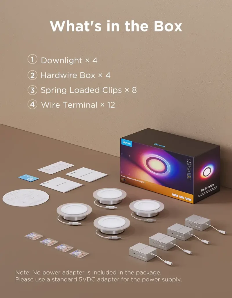 Contenido de la caja de las luces Govee Pro (Downlight 2), mostrando los componentes: 4 luces, 4 cajas de conexión, clips de resorte y terminales.