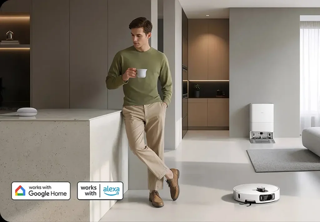 El robot aspirador inteligente Xiaomi Robot Vacuum 5 Pro en un hogar moderno, destacando su compatibilidad y control por voz con los asistentes Google Home y Amazon Alexa para una limpieza sin esfuerzo.