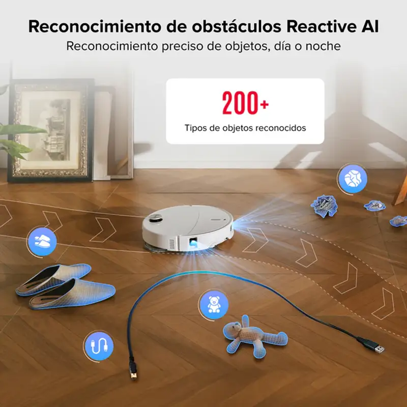 Imagen promocional del Roborock Qrevo Curv 2 Pro que ilustra su sistema de "Reconocimiento de obstáculos Reactive AI". El robot navega por un suelo de madera, detectando y trazando una ruta para evitar objetos comunes como zapatillas, un cable USB y un peluche. Un recuadro de texto destaca que el sistema puede identificar más de "200+ tipos de objetos reconocidos".