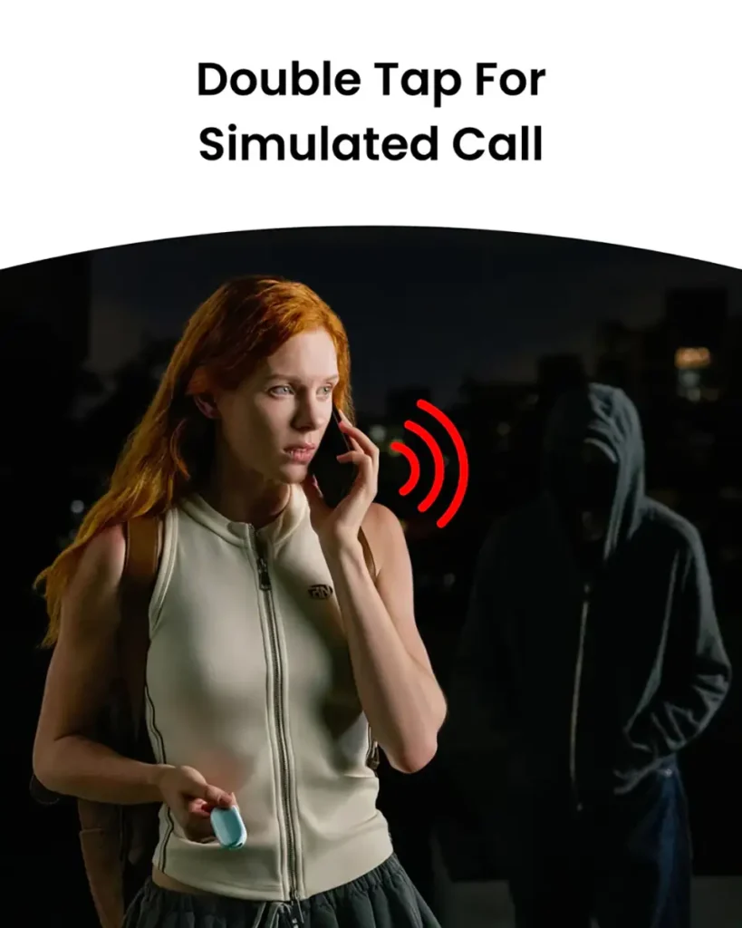 Imagen que muestra la función de llamada falsa de la SwitchBot Safety Alarm. Una mujer con expresión preocupada simula estar hablando por teléfono mientras una persona con capucha la observa en la oscuridad. El texto superior dice Double Tap For Simulated Call