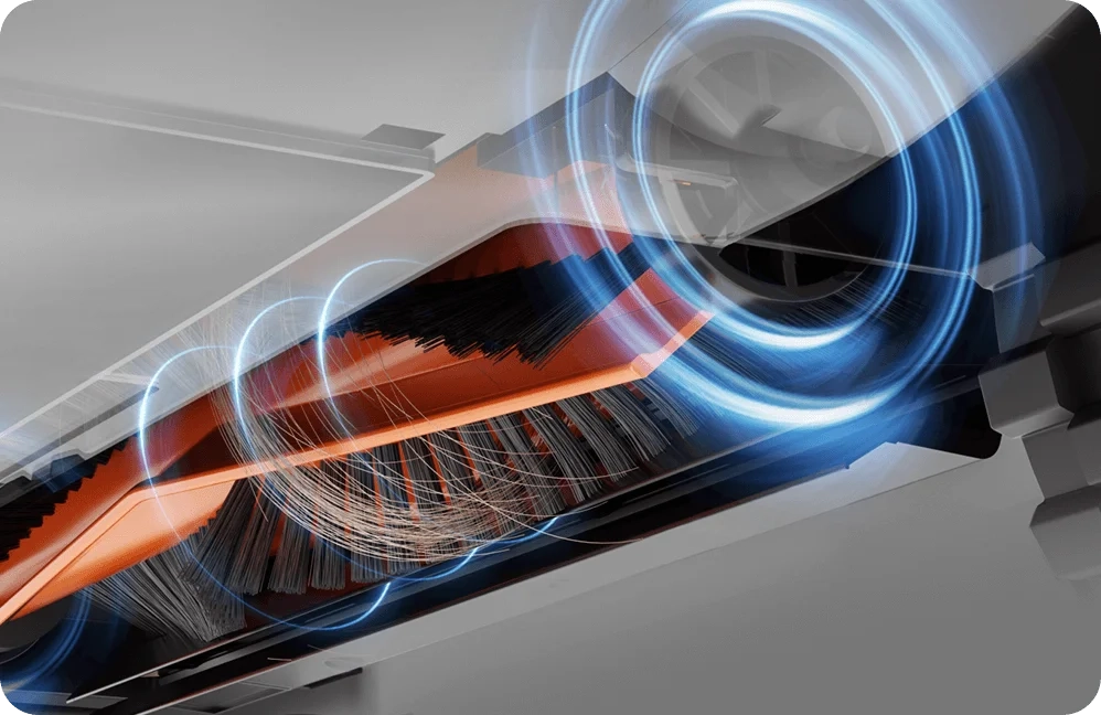 Sistema antienredos del cepillo principal del robot aspirador Xiaomi S40 Pro. La imagen muestra cómo las cerdas en forma de 'Y' desenredan y canalizan el pelo de mascota hacia la succión, una tecnología diseñada para evitar que el pelo se enrede en el rodillo y reducir el mantenimiento.