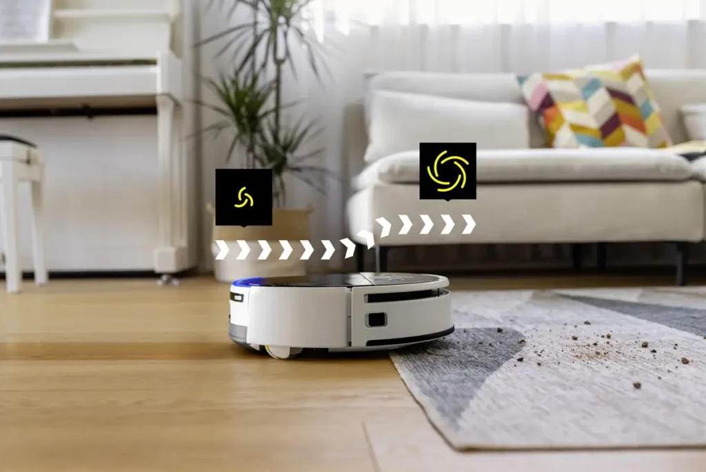 Robot aspirador y friegasuelos Kärcher RVF 7 detectando una alfombra y elevando el rodillo para evitar mojarla