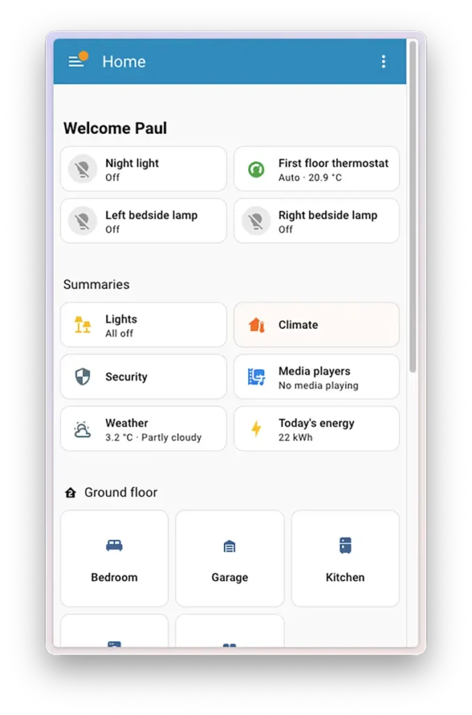 Captura del dashboard Home de Home Assistant 2026.1 en móvil con tarjetas de resumen arriba (luces, clima, seguridad, multimedia, tiempo y energía) y accesos por áreas