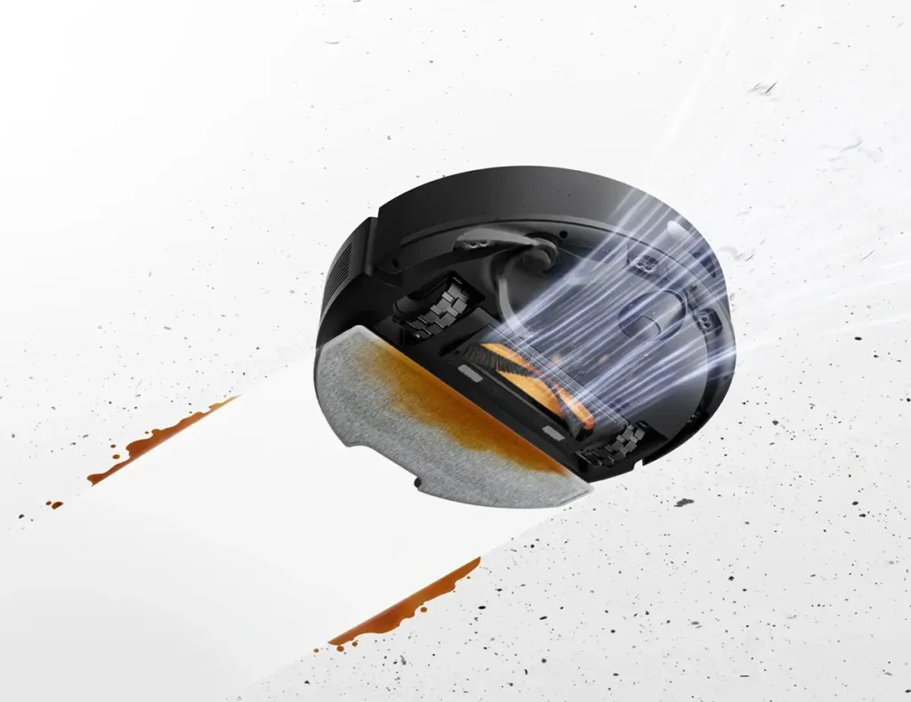 Parte inferior del Dreame D20 Air Plus con fregona plana y sistema de aspiración en funcionamiento