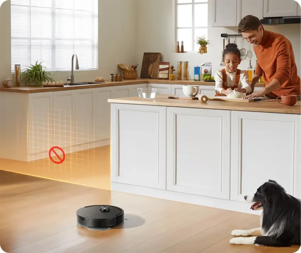 Dreame D20 Air Plus limpiando una cocina con zonas restringidas configuradas en la app